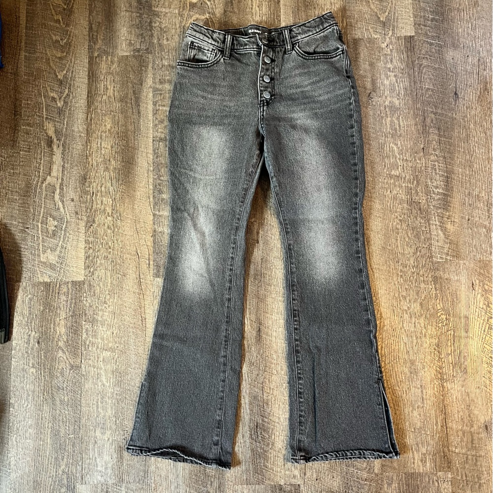 Old Navy Girls Dark Gray Flare Jeans with Cut on the bottom of pants.